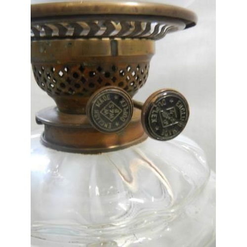 452 - A Victorian brass and metal oil lamp with opaque glass font, Duplex burner and later shade. COLLECT ... 