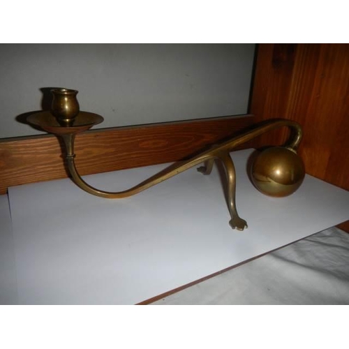 464 - A pair of Georgian brass candlesticks.