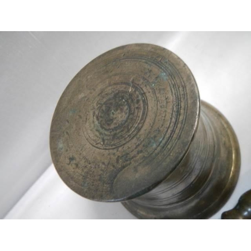 469 - A 19th century bronzed pestle and mortar.