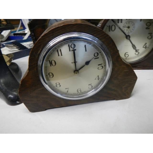 489 - Four good oak mantel clocks all in working order,