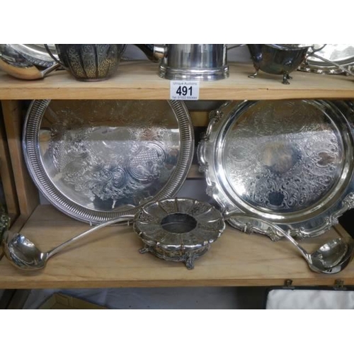 491 - Three shelves of good silver plate including trays, ladles, coffee pot, sauce boats etc.,