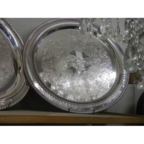 491 - Three shelves of good silver plate including trays, ladles, coffee pot, sauce boats etc.,