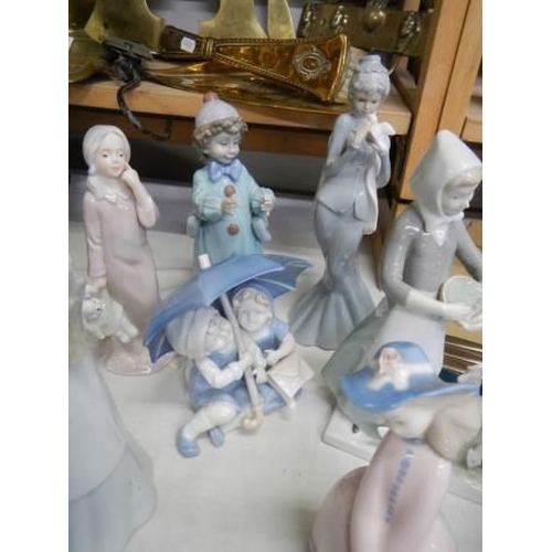 500 - Eight assorted figures including Lladro.