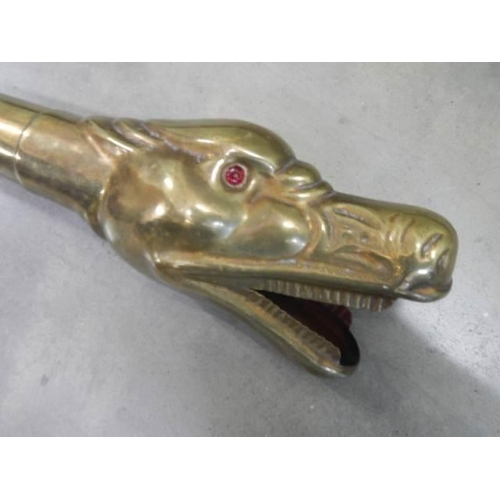 503 - A brass 'Python Head' hooter car horn, 96 cm long.