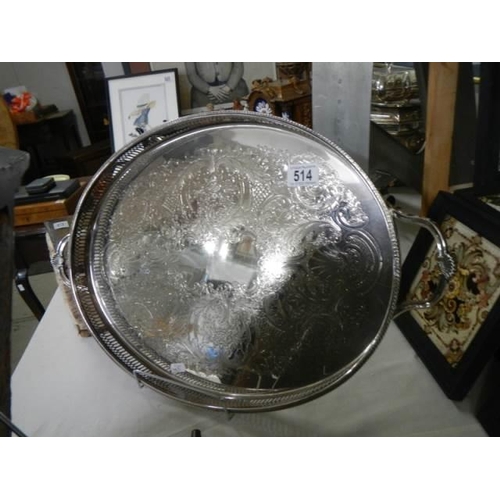 514 - A large silver plate gallery tray by 'Cavalier'. Finely etched and raised on bun feet, excellent con... 