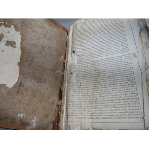 523 - An early 18th century Bible, some pages need attention but in fair condition for age.