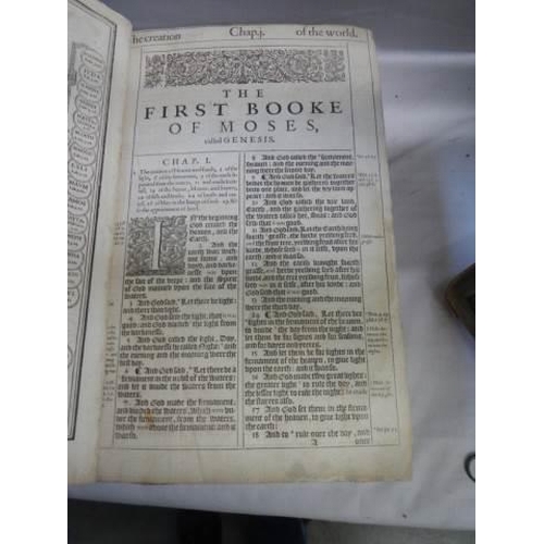 523 - An early 18th century Bible, some pages need attention but in fair condition for age.