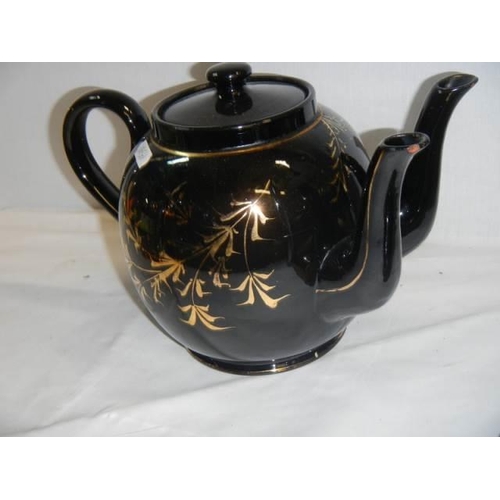 529 - An unusual late Victorian double spout teapot, (nibble on both spouts)