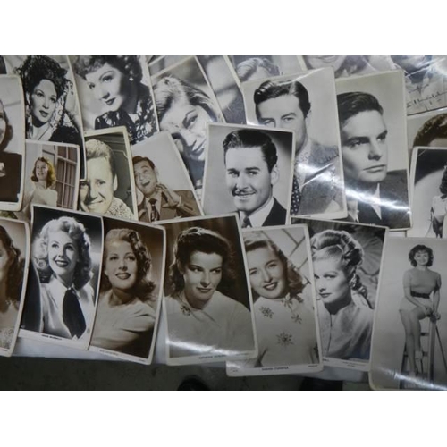 534 - A large quantity off mid 20th century film star postcards.