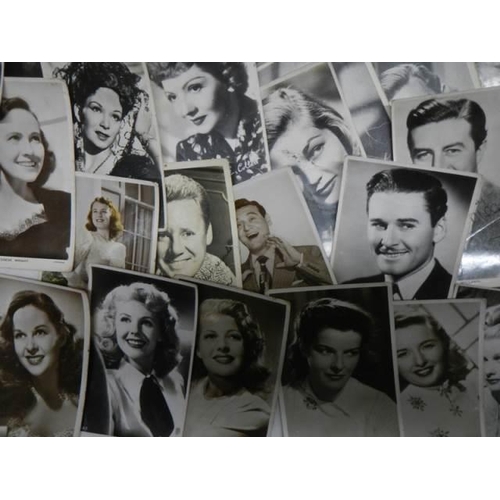 534 - A large quantity off mid 20th century film star postcards.