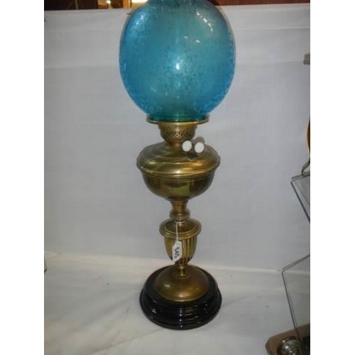 545 - A good Victorian oil lamp with original blue acid etched shade. COLLECT ONLY.