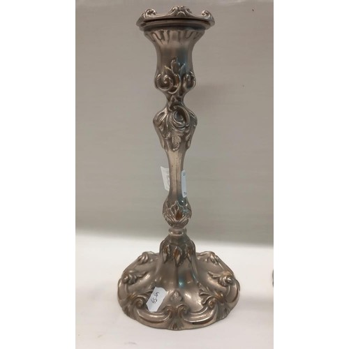 323 - A pair of art nouveau style silver plate candlesticks.