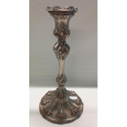 323 - A pair of art nouveau style silver plate candlesticks.