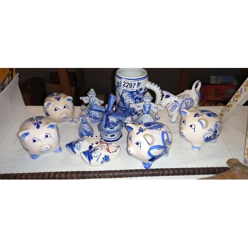 2297 - A quantity of hand painted Delft piggy banks etc