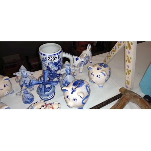 2297 - A quantity of hand painted Delft piggy banks etc