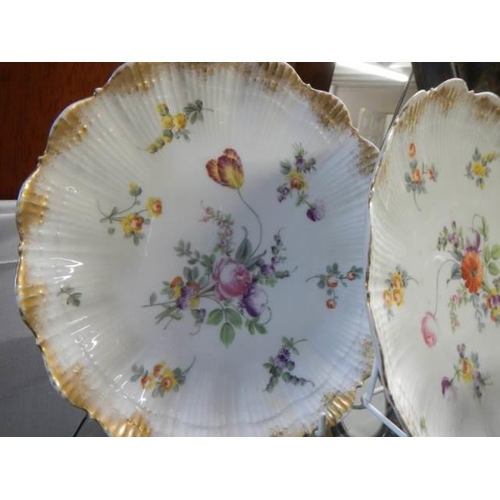 552 - Two Limoges porcelain plates and a Royal Copenhagen porcelain plate.