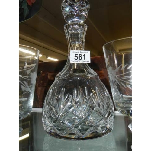 561 - A mid 20th century cut glass decanter and six glasses.