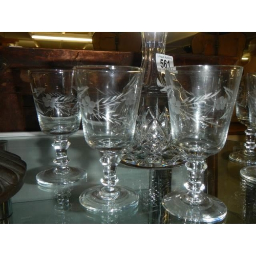 561 - A mid 20th century cut glass decanter and six glasses.