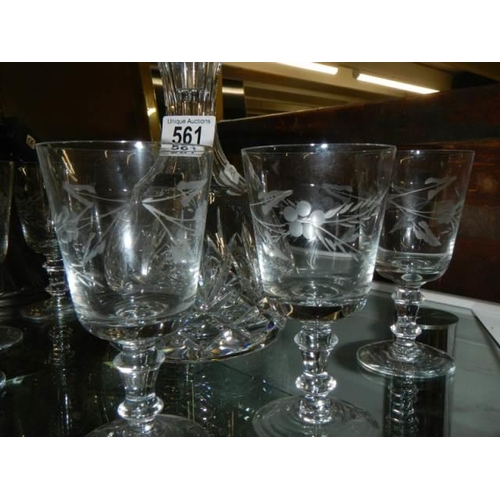 561 - A mid 20th century cut glass decanter and six glasses.