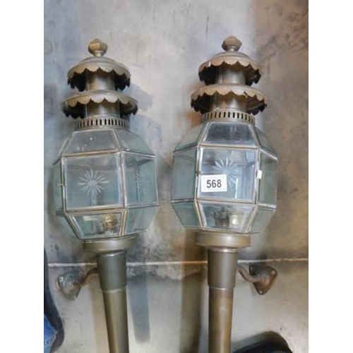 568 - A pair of late 20th century brass carriage lamps.