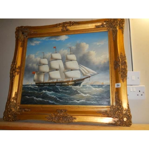 594 - A gilt framed oil on canvas of a sailing ship, Frame 82 x 71 cm, image 60 x 50 cm, COLLECT ONLY.