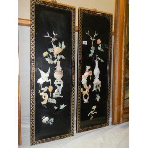 595 - A pair of Japanese lacquered and mother of pearl panels. COLLECT ONLY.