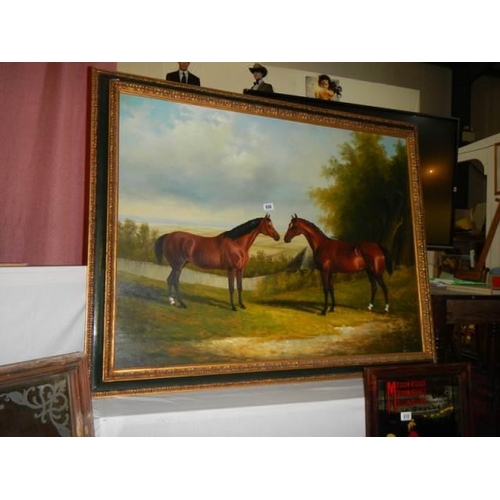 608 - A gilt framed oil on canvas study of two racehorses. COLLECT ONLY.