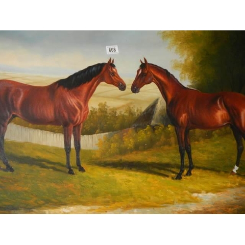 608 - A gilt framed oil on canvas study of two racehorses. COLLECT ONLY.