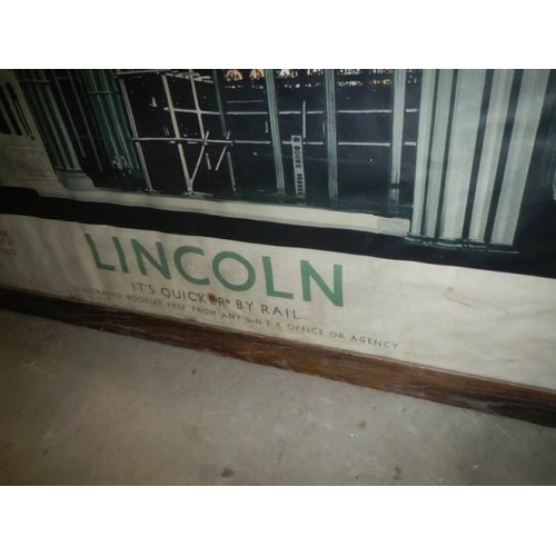 627 - A framed and glazed inside Lincoln Cathedral railway poster, frame 1401 x 114 cm, poster 125 x 100 c... 