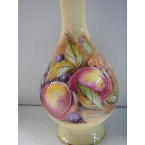 632 - An Aynsley Orchard Gold bud vase signed D Jones.