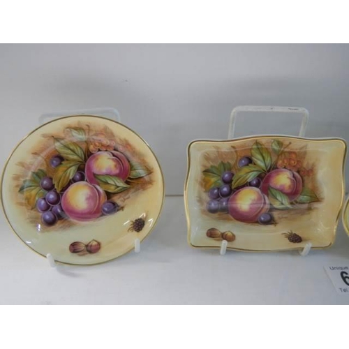 637 - Four pieces of Aynsley Orchard Gold porcelain - 2 round, 1 heart and 1 oblong pin tray all signed D ... 