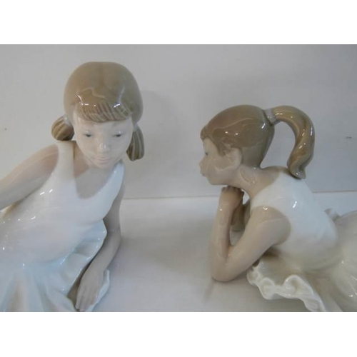 646 - Two NAO ballerina's, stamped, One is in good condition the other has slight damage to her leg.