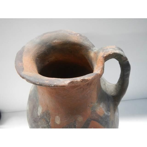 652 - A central American Provenance red terracotta jug.