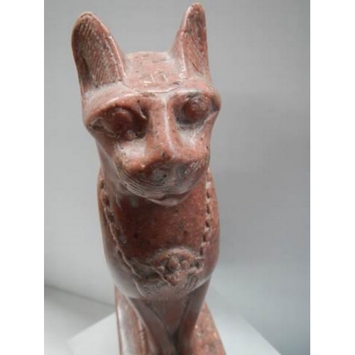 653 - A red granite figure of Egyptian cat god Bastet,