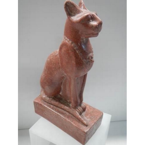 653 - A red granite figure of Egyptian cat god Bastet,