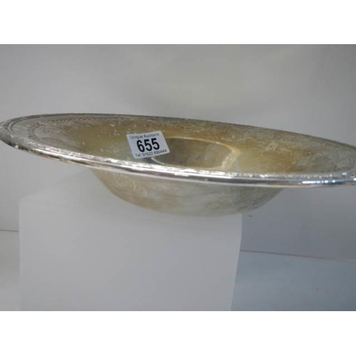 655 - A sterling silver dish, 25 cm diameter, 300 grams.