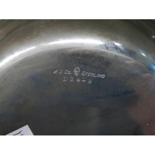 655 - A sterling silver dish, 25 cm diameter, 300 grams.