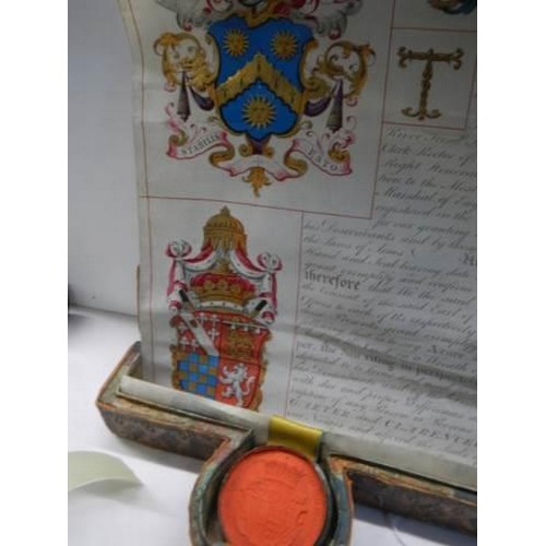 660 - A deed box with deed and a pair of wax seals in boxes.