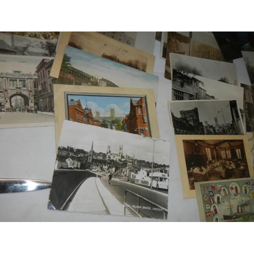 683 - A good collection of postcards including Lincoln.