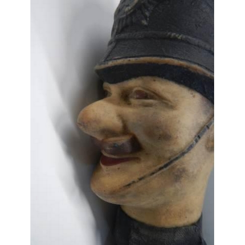 686 - A vintage hand puppet of a policeman.