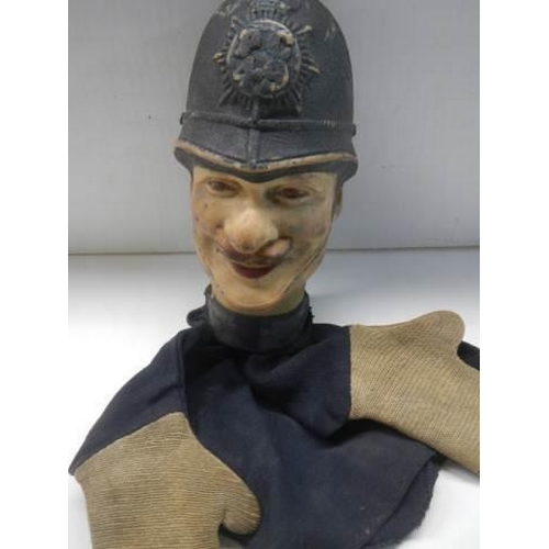 686 - A vintage hand puppet of a policeman.