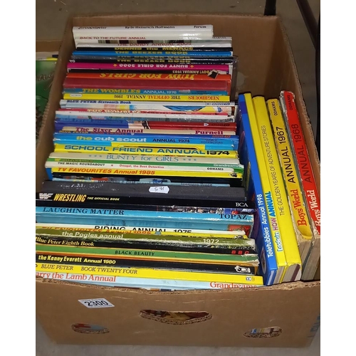 2300 - A good lot of annuals and books including Boys World, Judy, The Wombles, The Beezer etc