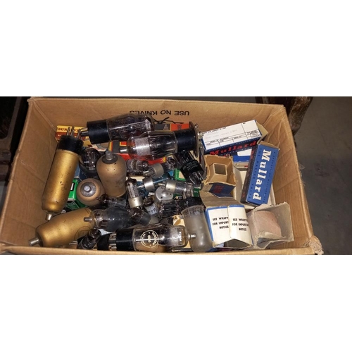 2319 - A box of vintage radio valves and a large USA studio light bulb