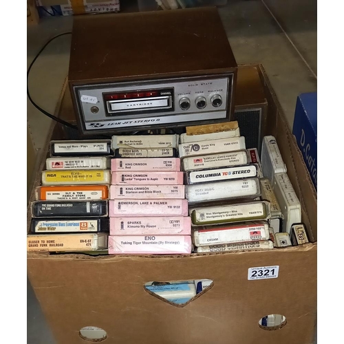 2321 - A good lot of 8 tracks and a Lear Jet stereo 8 player and speakers