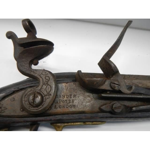 693 - A Flintlock pistol by Brander and Potts, London.