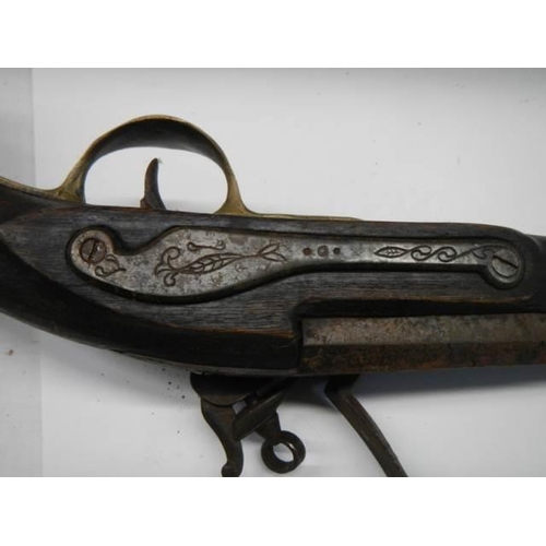 693 - A Flintlock pistol by Brander and Potts, London.