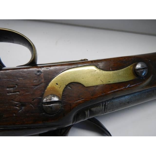 694 - A Tower of London flintlock pistol in excellent condition for its age. (early King George Crown mark... 