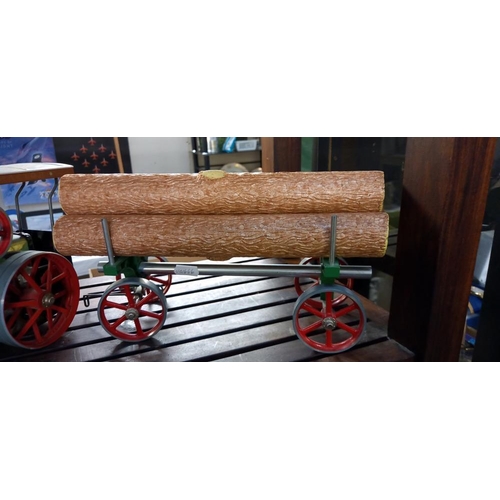 2381 - A Mamod traction engine with trailer containing logs