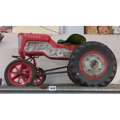 2406 - A vintage Tri-ang ride on pedal tractor missing steering wheel COLLECT ONLY