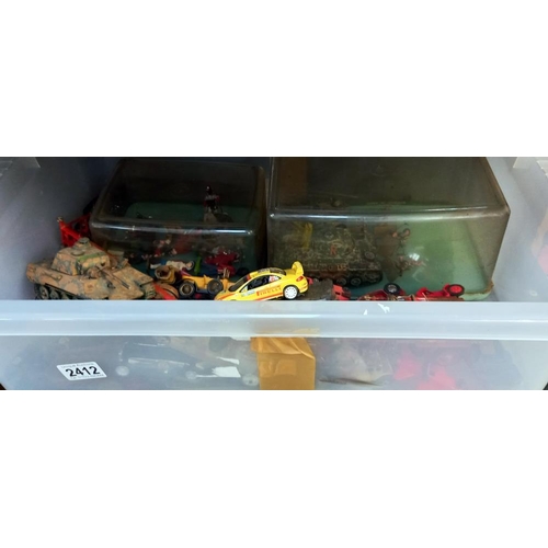 2412 - A box of mixed diecast and plastic including military vehicles, Matchbox etc